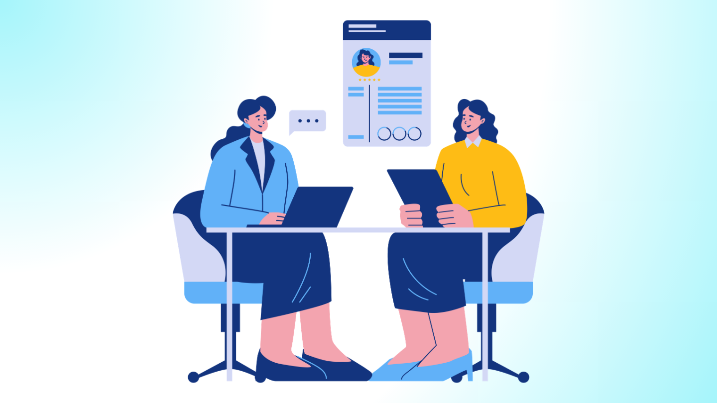 Two people in a job interview, one with a laptop and one reviewing a profile.